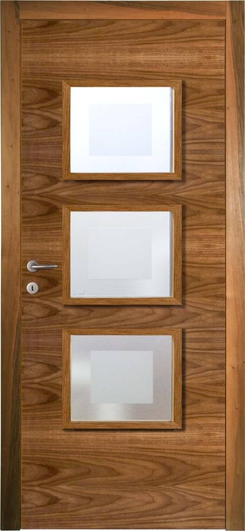 A full-height brown wood-grain door is shown within a matching wooden frame. Three rectangular light-colored glazed panels are arranged vertically down the middle, each bordered by a wood frame. A silver lever handle and round keyhole fitting appear on the left side of the door.
